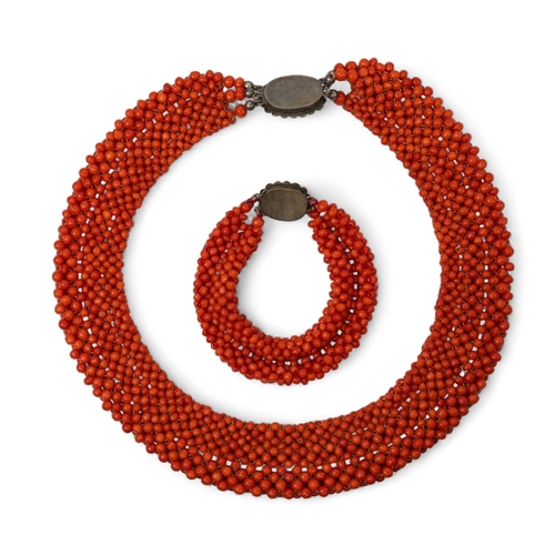 46 - An early 20th century plaited three-row red coral collar necklace and matching braceletTotal length:... 