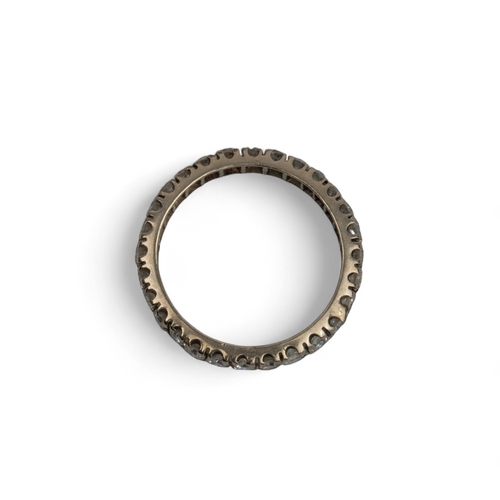 5 - A diamond eternity ring, set throughout with circular-cut diamonds. Mounted in white gold.Finger siz... 