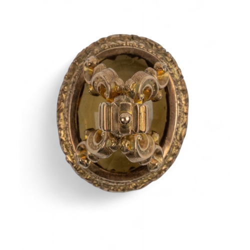 57 - Antique, early 19th centuryA large gold fob seal. The oval-shaped mixed-cut smoky quartz set within ... 