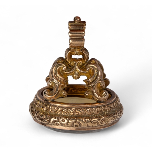 57 - Antique, early 19th centuryA large gold fob seal. The oval-shaped mixed-cut smoky quartz set within ... 