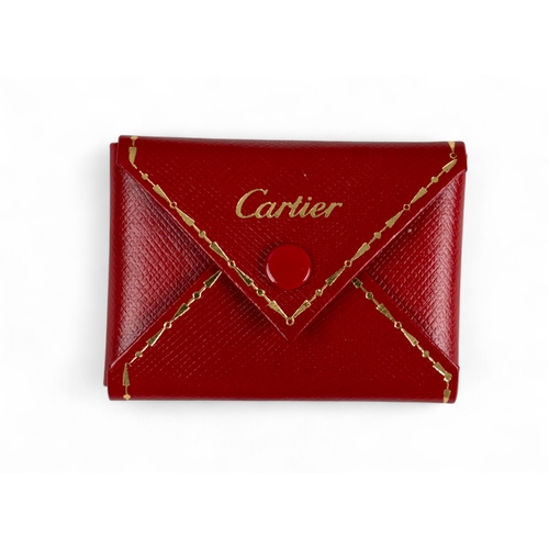 9 - Cartier, ParisAn 8k gold and emerald elephant pendant, numbered 815189. To an 18k gold chain.With or... 