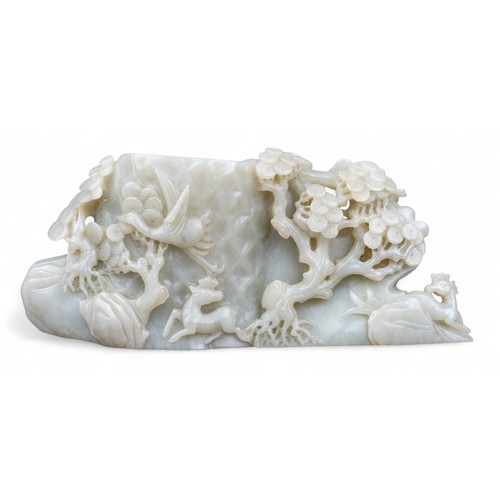 419 - Chinese, 18th century (?)A jade brush pot, the exterior carved with a male figure, trees, deer and a... 