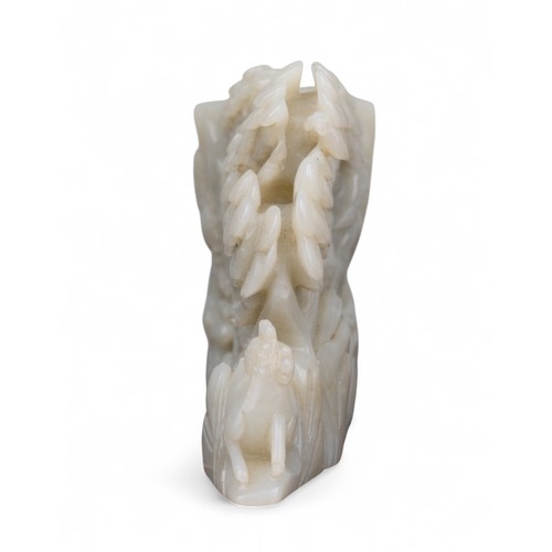 419 - Chinese, 18th century (?)A jade brush pot, the exterior carved with a male figure, trees, deer and a... 