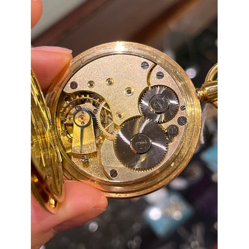 3 - Circa 1900A half-hunter yellow gold pocket watch. The white enamelled dial with black enamel Roman n... 