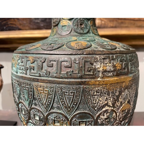420 - Chinese, Qianlong mark and period (1735-1796)An important Imperial bronze and gilt vaseOf baluster f... 