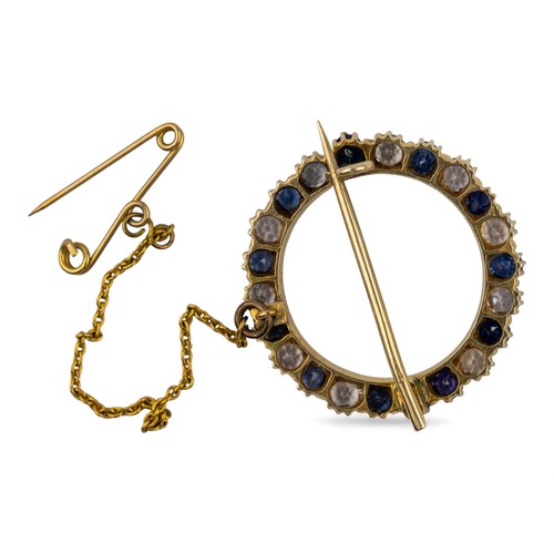 12 - Circa 1910sA white and blue sapphire circle brooch, mounted in yellow goldWeight: Approx. 6.14 grams... 