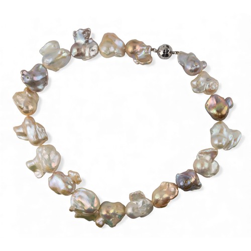 22 - A Baroque cultured pearl necklaceSlightly graduated row of nineteen multicoloured baroque pearls to ... 