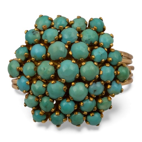 23 - Circa 1960A turquoise and yellow gold wirework cluster ringWeight: Approx. 8.22 gramsRing size: Q... 