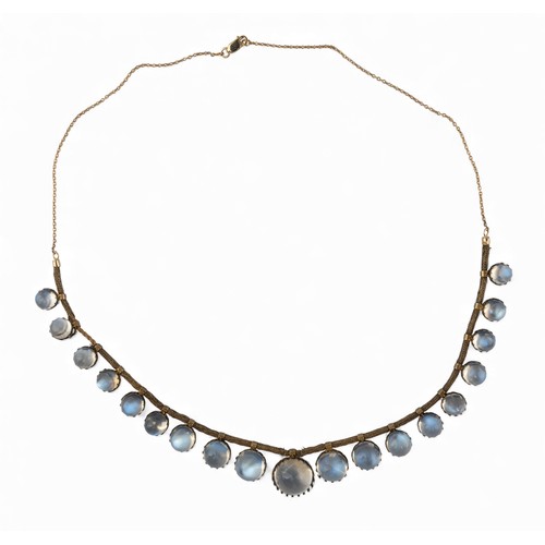 41 - An antique moonstone necklace, circa 1900Composed of a graduated fringe of nineteen circular-shaped ... 