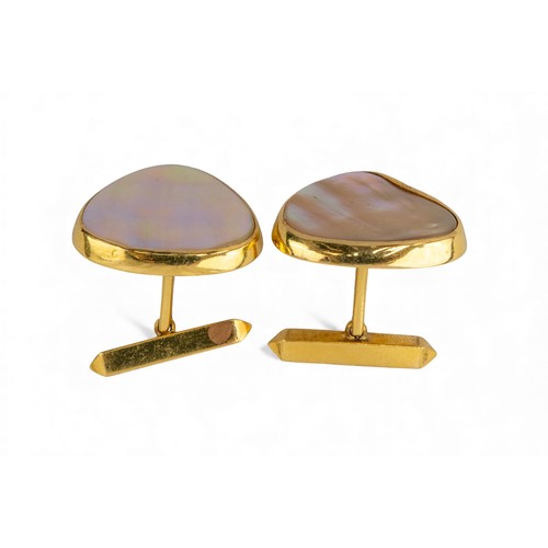 57 - Circa 1970sA pair of mother of pearl and yellow metal triangular shaped cufflinksTotal weight:Approx... 