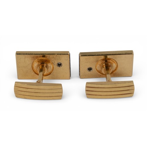 6 - 1970sA pair of 18k gold lapis lazuli and diamond cufflinks. The rectangular lapis lazuli panel, inse... 