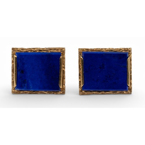 9 - 1970s, A pair of lapis lazuli and 18k yellow gold cufflinksThe bright blue lapis lazuli tablets set ... 