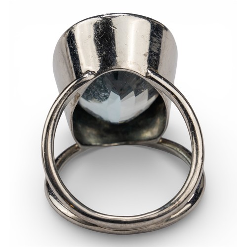 12 - Two aquamarine dress ringsThe kite-shaped ring mounted in white gold