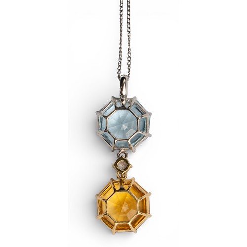 31 - Art Deco styleAn aquamarine, diamond, and citrine pendant. The pendant set with two octagonal-cut st... 