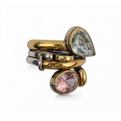 46 - Barbara BertagnolliAn aquamarine and kunzite silver and gold dress ring. Set with a collet-set pear-... 