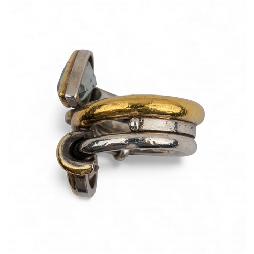 46 - Barbara BertagnolliAn aquamarine and kunzite silver and gold dress ring. Set with a collet-set pear-... 
