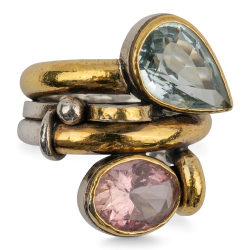 46 - Barbara BertagnolliAn aquamarine and kunzite silver and gold dress ring. Set with a collet-set pear-... 