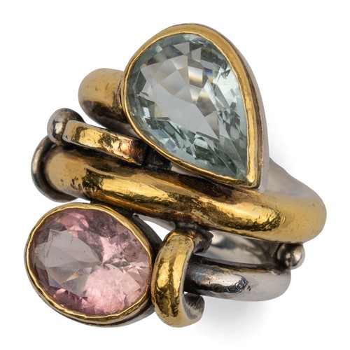 46 - Barbara BertagnolliAn aquamarine and kunzite silver and gold dress ring. Set with a collet-set pear-... 