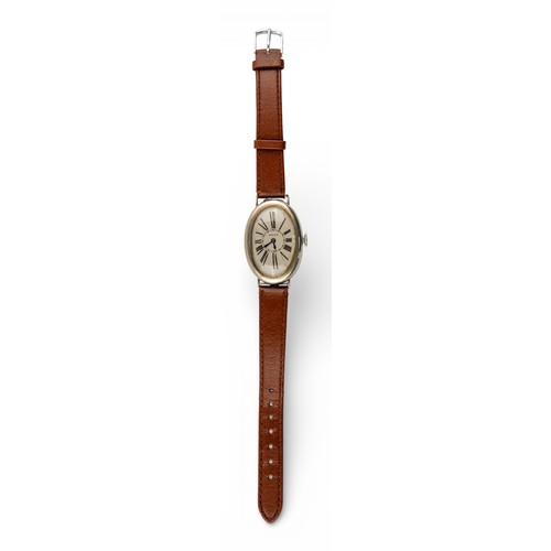 RolexA vintage silver oval-cased wristwatch, 1930s.Dimensions: (Dial ...