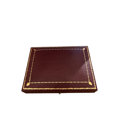 19 - A set of white gold and mother of pearl dress studs and cufflinksStamped 375In a red leather Asprey ... 