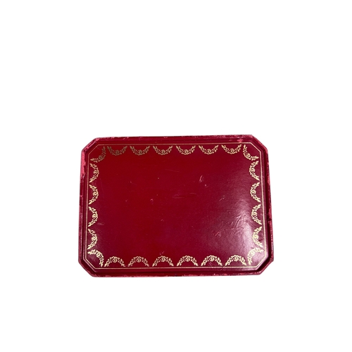 21A - CartierA pair of 18 carat white gold C de Cartier cufflinksIn original Cartier box, with certificate... 