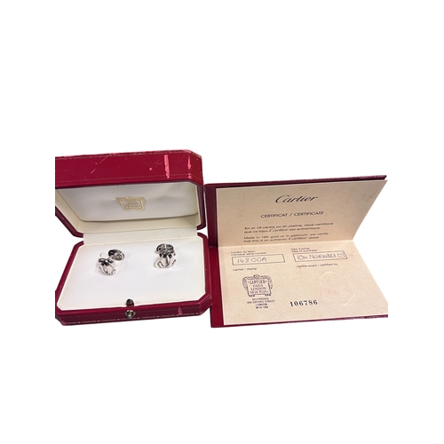 21A - CartierA pair of 18 carat white gold C de Cartier cufflinksIn original Cartier box, with certificate... 