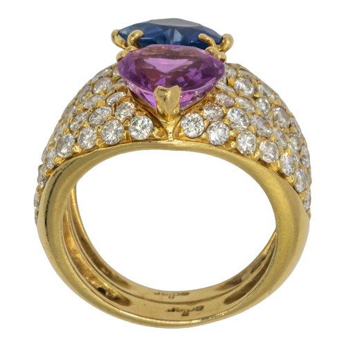 15A - Adler, Geneva, circa 1990A fine sapphire and diamond ring. The twin graduated pave-set yellow gold b... 