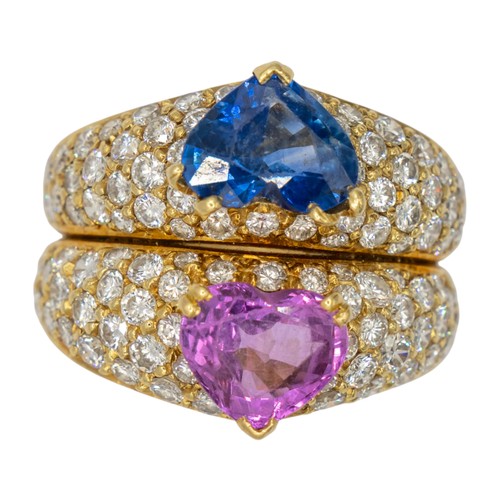 15A - Adler, Geneva, circa 1990A fine sapphire and diamond ring. The twin graduated pave-set yellow gold b... 
