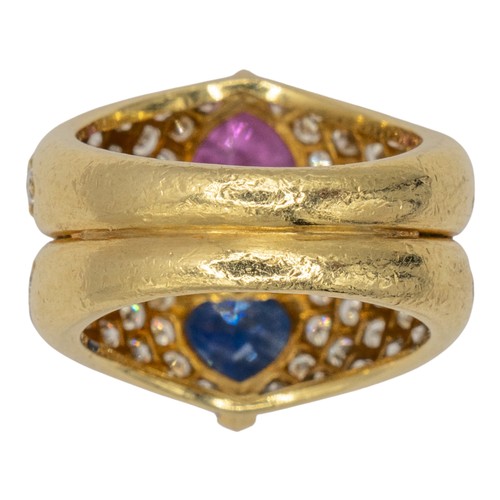 15A - Adler, Geneva, circa 1990A fine sapphire and diamond ring. The twin graduated pave-set yellow gold b... 
