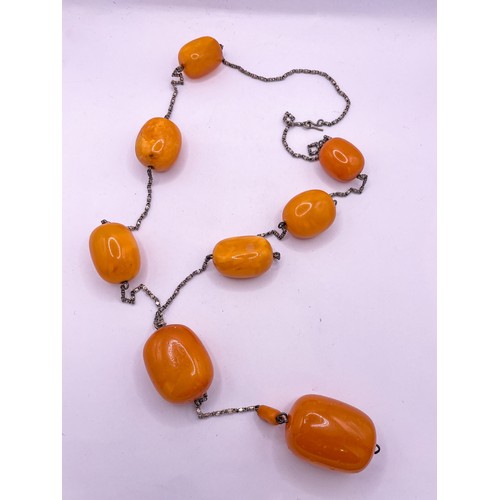 5 - Ottoman, Baltic amber bead necklace, composed of eight large butterscotch amber beads. With fine fan... 