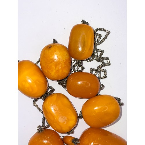5 - Ottoman, Baltic amber bead necklace, composed of eight large butterscotch amber beads. With fine fan... 