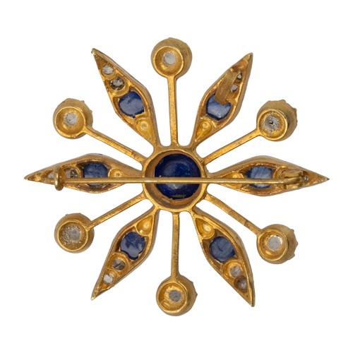 16 - A sapphire, moonstone and diamond flower-head brooch
