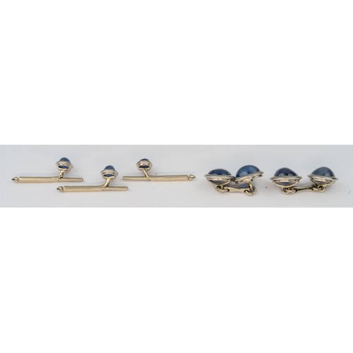 33 - Art Deco, A pair of cabochon sapphire cufflinks and three studsThe pale cabochon sapphires mounted i... 