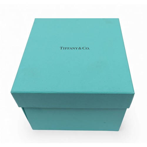 49 - Tiffany & Co, A 'Tiffany Keys' Wire Heart Bangle18 ct gold and in its original box.Total weight:... 