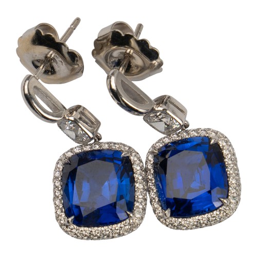 57 - A pair of sapphire and diamond pendant earringsEach cushion-shaped sapphire claw-set within a pave-s... 