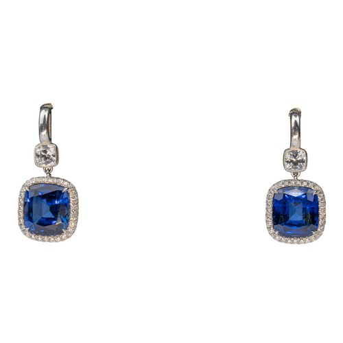 57 - A pair of sapphire and diamond pendant earringsEach cushion-shaped sapphire claw-set within a pave-s... 