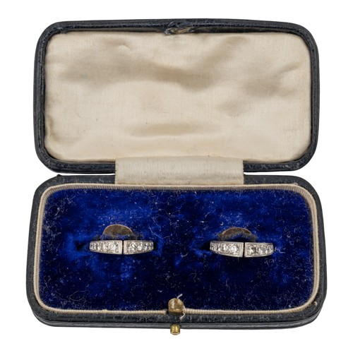 54 - A pair of diamond and white gold cufflinks, circa 1940Designed as a stirrup link, set throughout wit... 