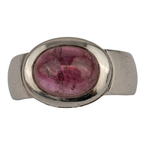 58 - H&uuml;lse, A platinum, diamond and tourmaline dress ringThe cabochon red tourmaline with a surround... 