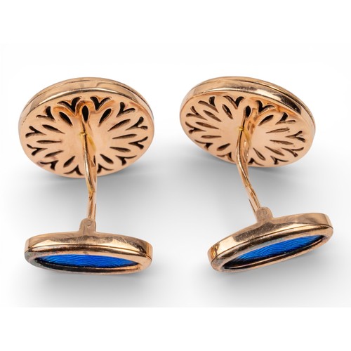66 - A pair of rose-coloured gold enamel and diamond cufflinks, probably Russian.The circular tops with p... 