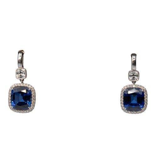 57 - A pair of sapphire and diamond pendant earringsEach cushion-shaped sapphire claw-set within a pave-s... 