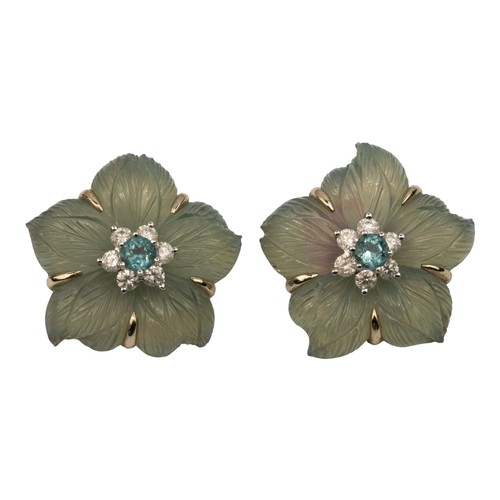 65 - Seaman Schepps, A pair of carved crystal, diamond and aquamarine ear clipsDesigned as a five-petal f... 