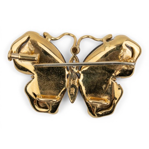61 - An 18 ct. gold tourmaline and diamond butterfly brooch, circa 1960sThe thorax set with a single marq... 