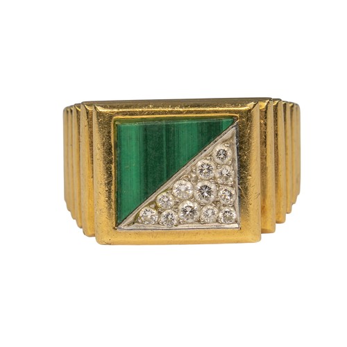 69 - Piaget, 1970sAn 18k gold, diamond and malachite gentleman's dress ring. The heavy yellow gold ribbed... 
