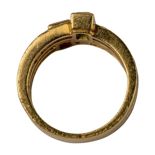 73 - A ruby, emerald and diamond two-band ring, circa 1980Set to the centre with a square-cut ruby and a ... 