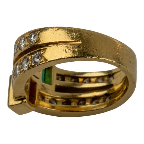 73 - A ruby, emerald and diamond two-band ring, circa 1980Set to the centre with a square-cut ruby and a ... 