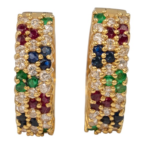 68 - A pair of multi gem-set ear clips, circa 1980Set throughout with diamonds, rubies and sapphiresTotal... 