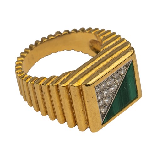 69 - Piaget, 1970sAn 18k gold, diamond and malachite gentleman's dress ring. The heavy yellow gold ribbed... 