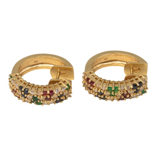 68 - A pair of multi gem-set ear clips, circa 1980Set throughout with diamonds, rubies and sapphiresTotal... 