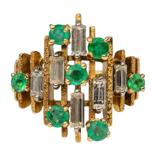 81 - Andrew Grima style, 1970sAn abstract emerald and diamond dress ring, mounted in 18k yellow gold. Set... 