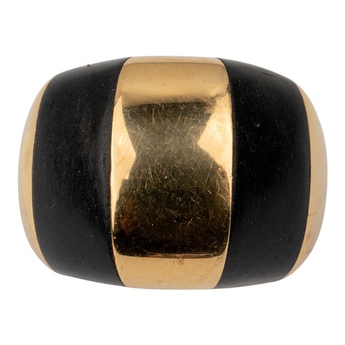 79 - Oromalia, A rose-coloured gold and wood inset dress ringIn avant-garde style, mounted in 18k gold.Fi... 